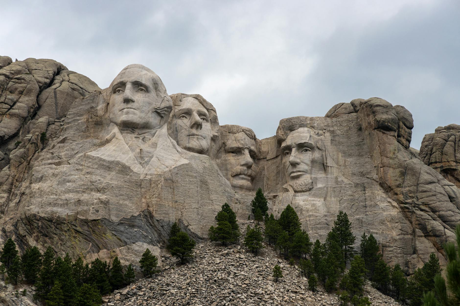 A striking view of Mount Rushmore featuring the carved faces of U.S. Presidents in the Black Hills of South Dakota.