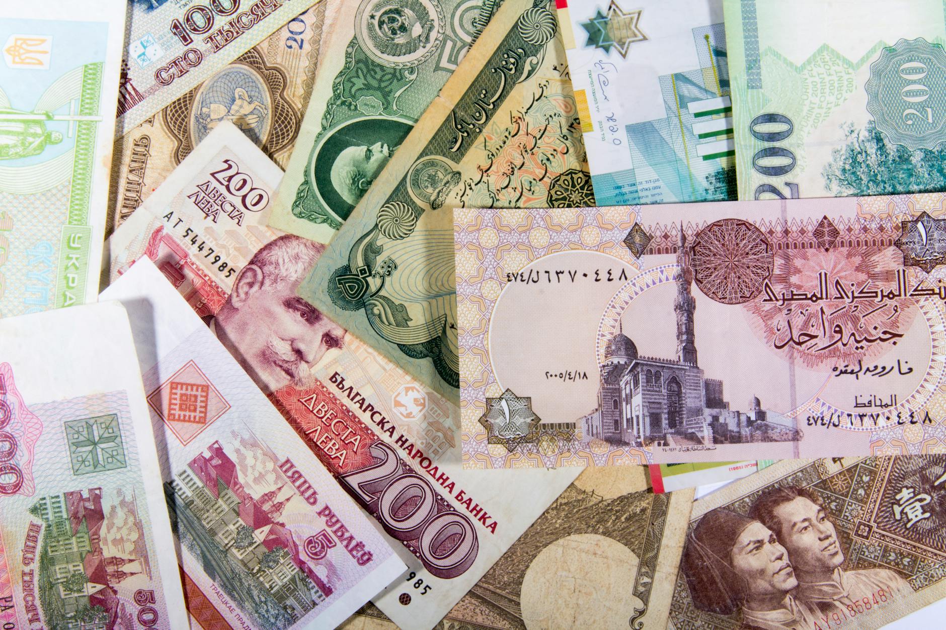 A vibrant collection of various international banknotes showcasing global diversity.