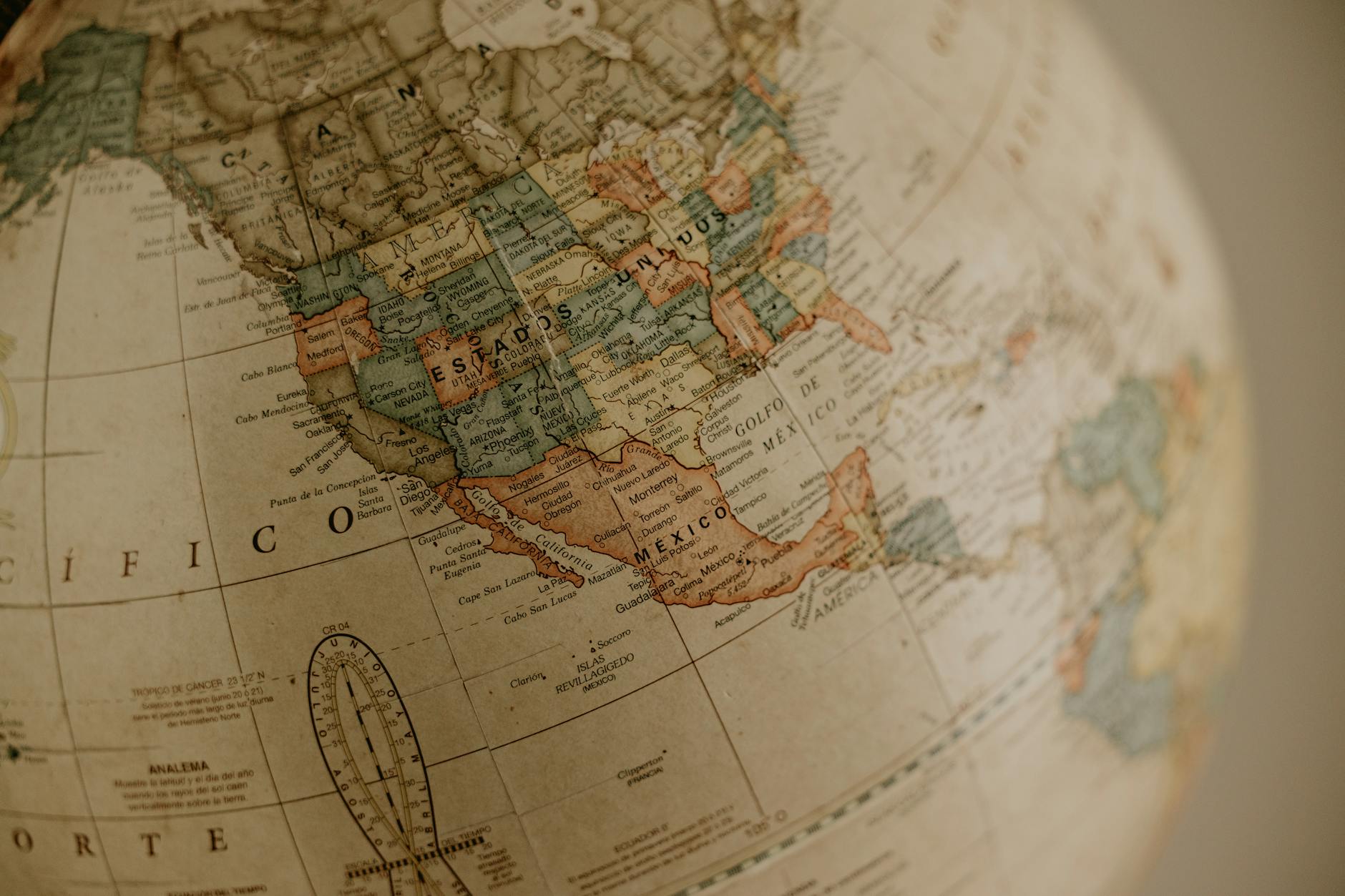 A vintage globe focusing on North America and Mexico with an antique aesthetic.