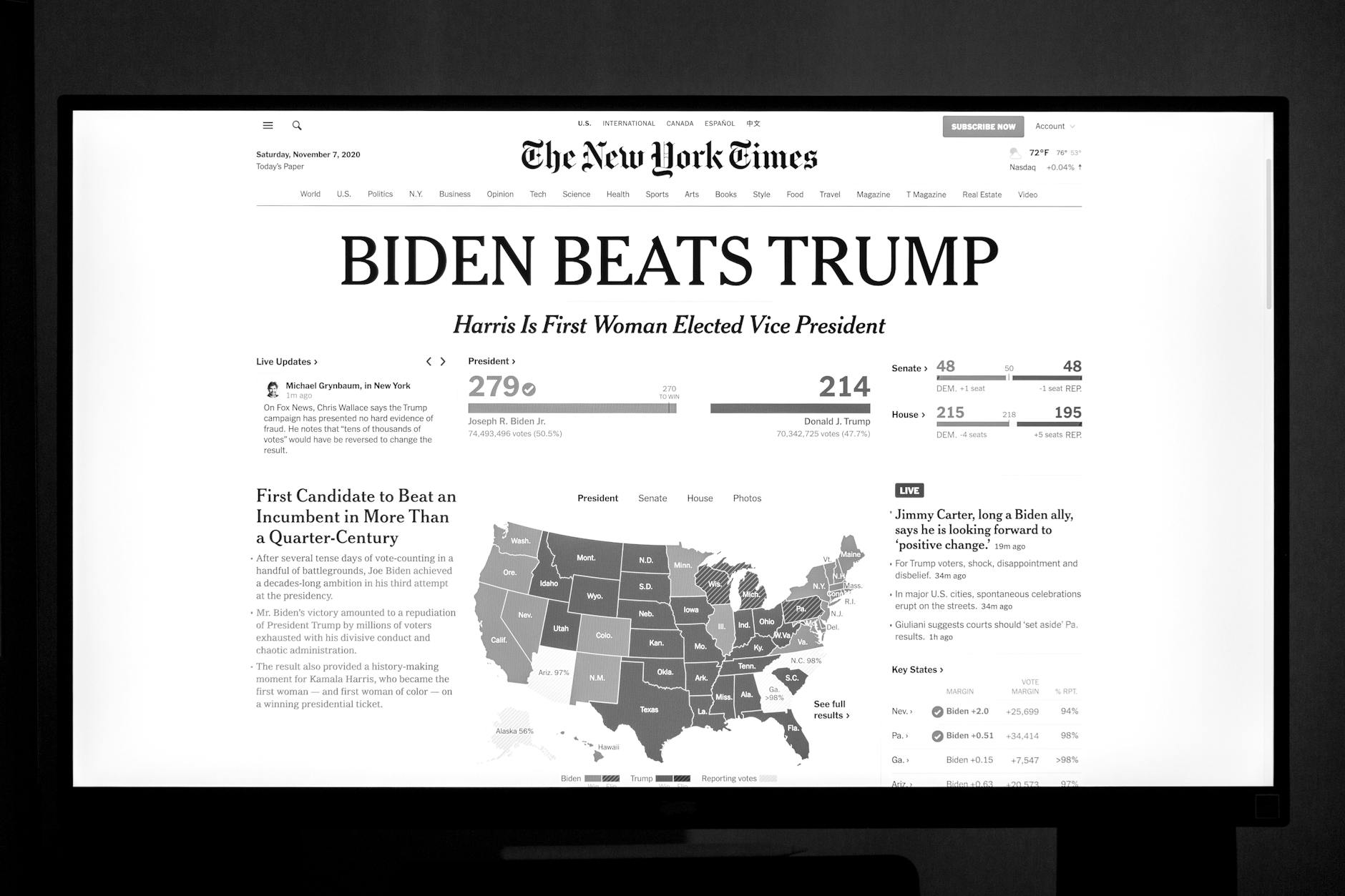 Biden wins presidency over Trump as detailed on newspaper front page.