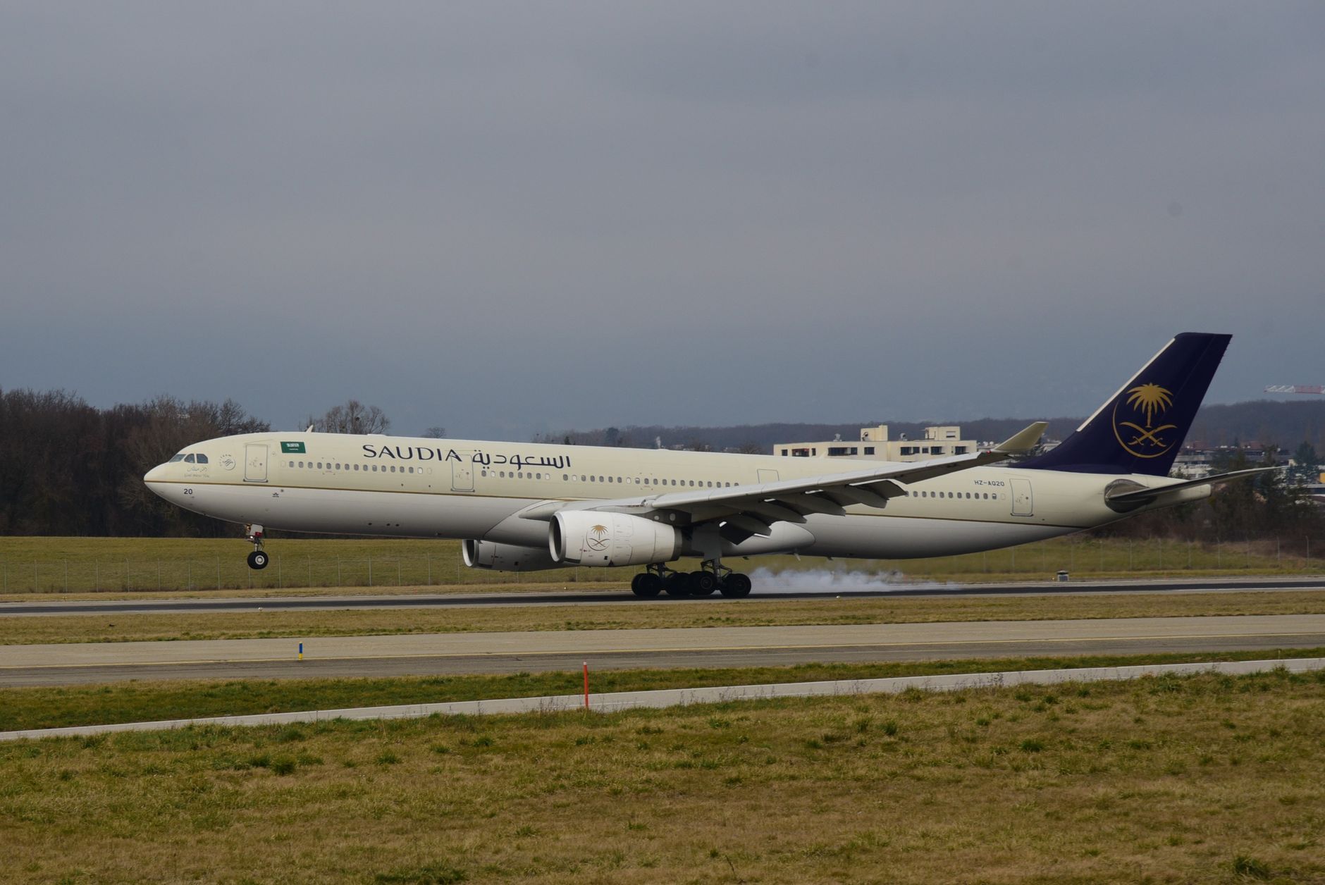 Vance Sends satire image: Saudia Airlines aircraft safely lands on a cloudy day in Geneva, showcasing aviation precision.