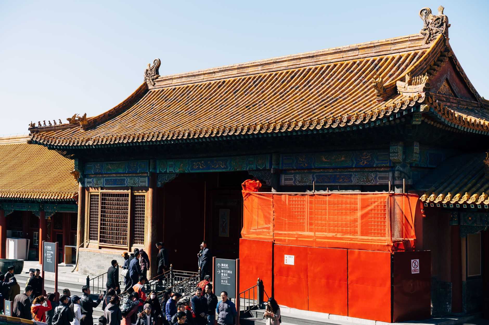 satire-image-86 Trump State satire image: People visiting a historical Chinese temple in Beijing under clear skies.
